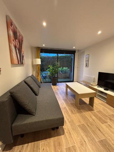 Appartement chez maison hôte rez de jardin