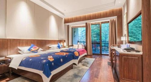Katil atau katil-katil dalam bilik di Pingtian Bandao Hotel