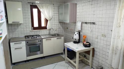 Kuchyň nebo kuchyňský kout v ubytování Casa Angy