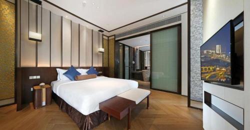 Katil atau katil-katil dalam bilik di Fliport Hotel Zhangzhou Yuanshan