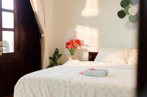 Postel nebo postele na pokoji v ubytování Green home, Huế