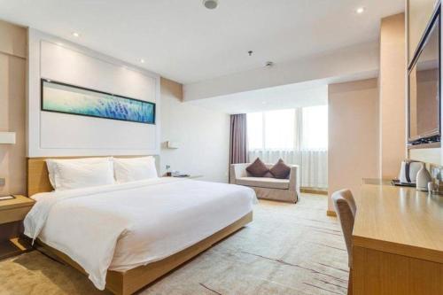 Postel nebo postele na pokoji v ubytování Lavande Hotel Xian Gaoxin Branch