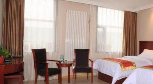 Letto o letti in una camera di GreenTree Inn Beijing Tonzhou Maju Bridge No.2 Express Hotel