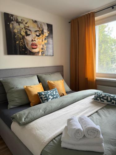 Ένα ή περισσότερα κρεβάτια σε δωμάτιο στο ZENNA Apartment v centre mesta s parkovaním FREE
