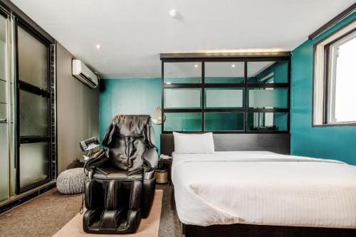 Ένα ή περισσότερα κρεβάτια σε δωμάτιο στο M7 Business Hotel