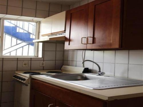 Kuchyň nebo kuchyňský kout v ubytování Curacao Lodge