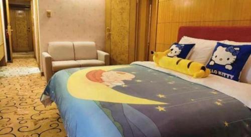 a bedroom with a bed with a cartoon character on it at Golden Lustre Hotel in Shenzhen