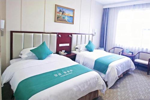 Cama o camas de una habitación en Nanning Yongzhou Hotel