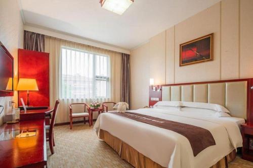 Cama o camas de una habitación en Nanning Yongzhou Hotel