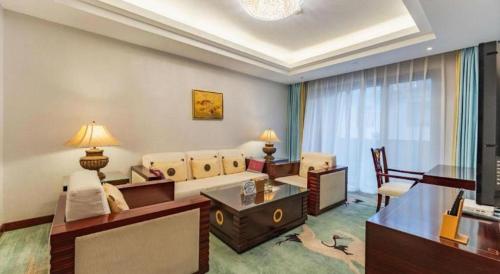 Χώρος καθιστικού στο Wudangshan Jianguo Hotel