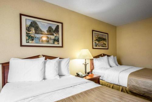Ένα ή περισσότερα κρεβάτια σε δωμάτιο στο Quality Inn Bessemer I-20 exit 108
