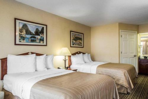 Ένα ή περισσότερα κρεβάτια σε δωμάτιο στο Quality Inn Bessemer I-20 exit 108