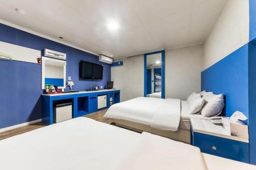 Letto o letti in una camera di Nabiya Hotel