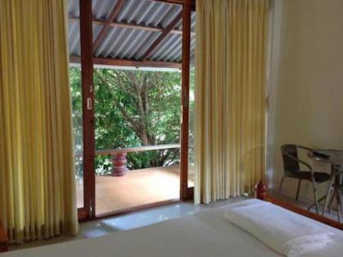 Postel nebo postele na pokoji v ubytování River Park Resort