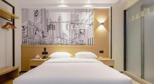 Cama o camas de una habitación en City Comfort Inn Nanning Railway Station Guangxi University