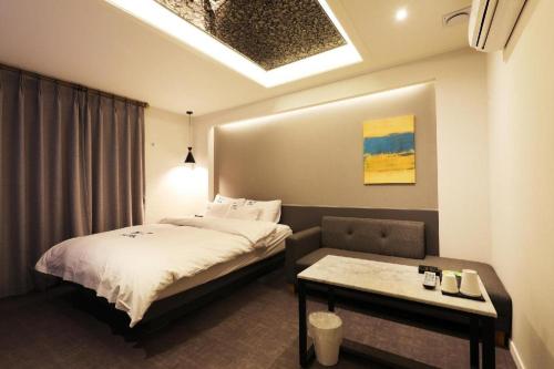 Yongin(Giheung) M7 Hotelにあるベッド