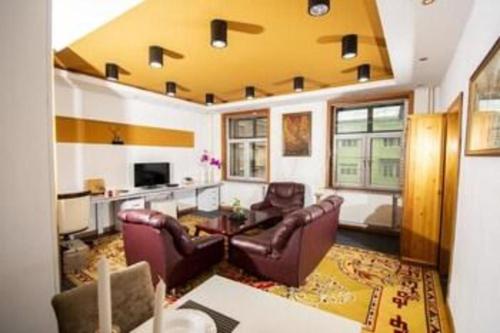 TV a/nebo společenská místnost v ubytování Mika Hotel