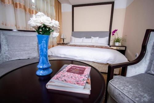 Postel nebo postele na pokoji v ubytování Mika Hotel