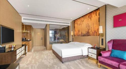 TV a/nebo společenská místnost v ubytování Shijiazhuang Ximeijin Continental Hotel