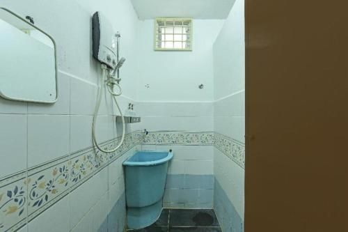 Koupelna v ubytování OYO 90522 Alma Sweet Home