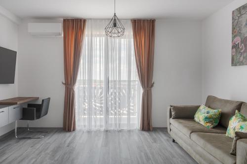 Μια τηλεόραση ή/και κέντρο ψυχαγωγίας στο Golden Hour Apartment