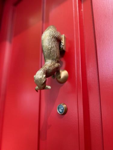 a door with a snake sticking out of it at 2 bed period Victorian property in historic town in Haddington