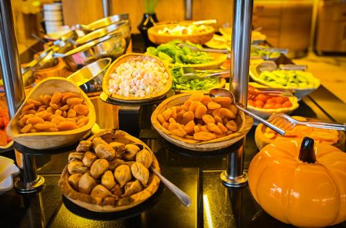 a buffet with many different types of food in bowls at Jasmin Elite Residence & SPA in Gümbet