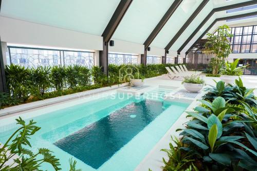 an image of a swimming pool in a building at Paxtonz by YourSuperhost in Kuala Lumpur