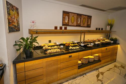 a buffet line with many different types of food at Jasmin Elite Residence & SPA in Gümbet