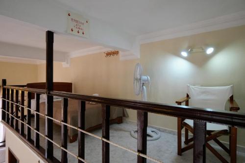 a bathroom with a toilet in a room at Stone Living Symi Central Apartments in Symi