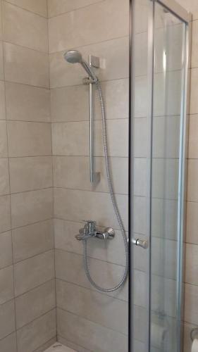 Ванна кімната в Villa Sisa Apartment