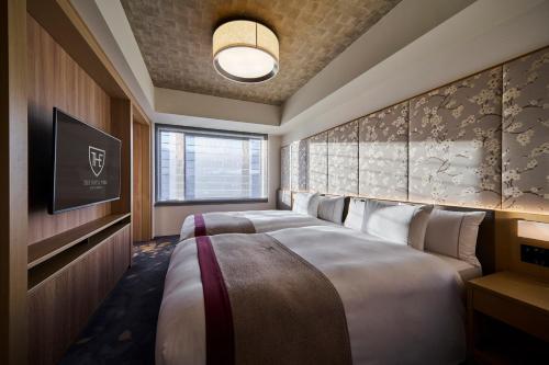 Кровать или кровати в номере The Royal Park Hotel Kyoto Umekoji