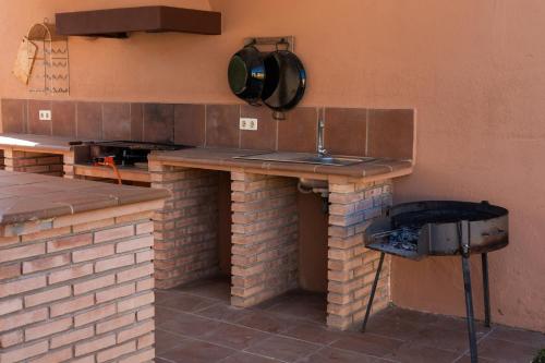 Кухня или мини-кухня в Olivos 1C
