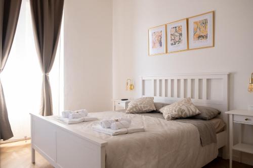 Postel nebo postele na pokoji v ubytování Casamè Apartment Sulmona - a due passi da centro, free bike park