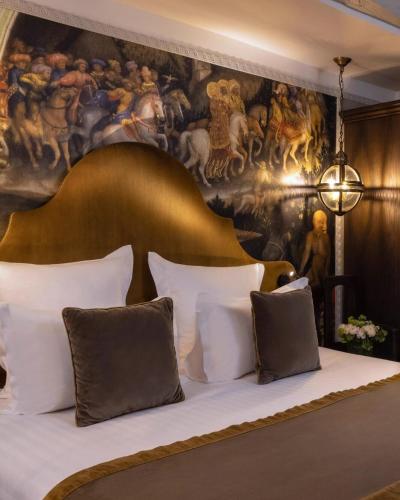 Postel nebo postele na pokoji v ubytování Hotel Grand Villa Suite Near IGI Airport