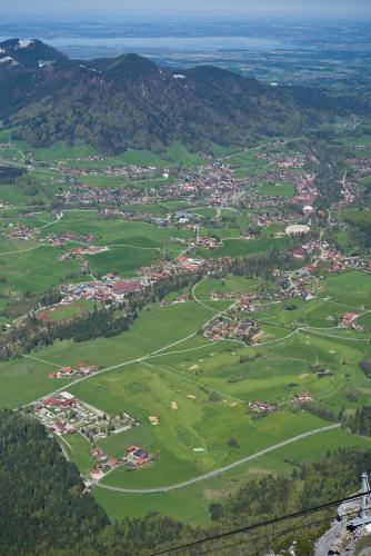 an aerial view of a village in the mountains at Hotel-Restaurant Zum Hirschhaus Inklusiv Chiemgaukarte in Ruhpolding