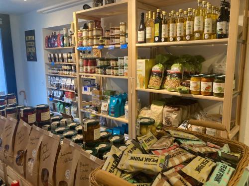 a store filled with lots of food and drinks at Organic BnB Froschkoenig Chaiserstock in Gersau