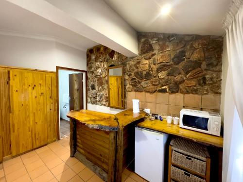 Η κουζίνα ή μικρή κουζίνα στο Centurion Guest House and Lodge