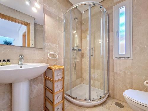 a bathroom with a shower and a sink and a toilet at Mar Menor Golf Villa - 6310 in Torre-Pacheco
