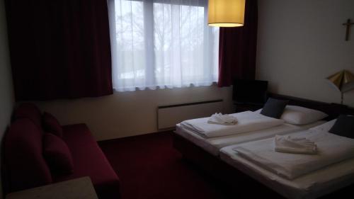 Postel nebo postele na pokoji v ubytování Ferienherbergen S & J Zeisz
