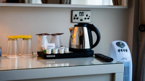 Hotel St George by Ninaにあるコーヒーまたはお茶