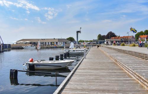 a group of boats are docked at a dock at 2 Bedroom Awesome Apartment In Ystad in Ystad