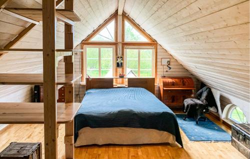 a bedroom with a bed in a attic at Nice Home In Bolum With Wifi in Bolum