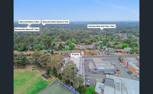 an aerial view of a town with a parking lot at Luxury Room Budget Friendly in Beecroft