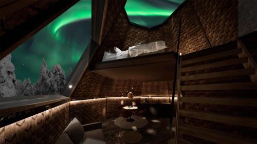 an interior view of a room with an aquarium at Aurora Village Ivalo in Ivalo