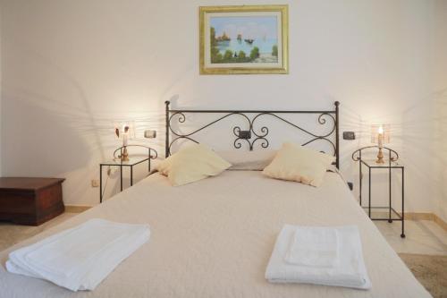 Ένα ή περισσότερα κρεβάτια σε δωμάτιο στο Agriturismo Podere Acqualoreto