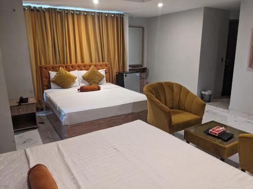 Кровать или кровати в номере Nuva Hotel