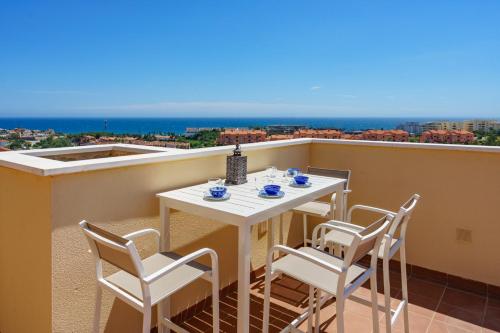 3 bedroom, top floor with fantastic terraces, sea view and pools