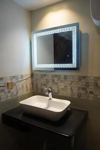 Ванная комната в Nuva Hotel