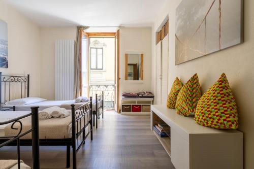 Ένα ή περισσότερα κρεβάτια σε δωμάτιο στο Apartment Katia - Menaggio